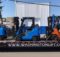 6 blue and 1 orange Mitsubishi forklifts at Washington Liftruck